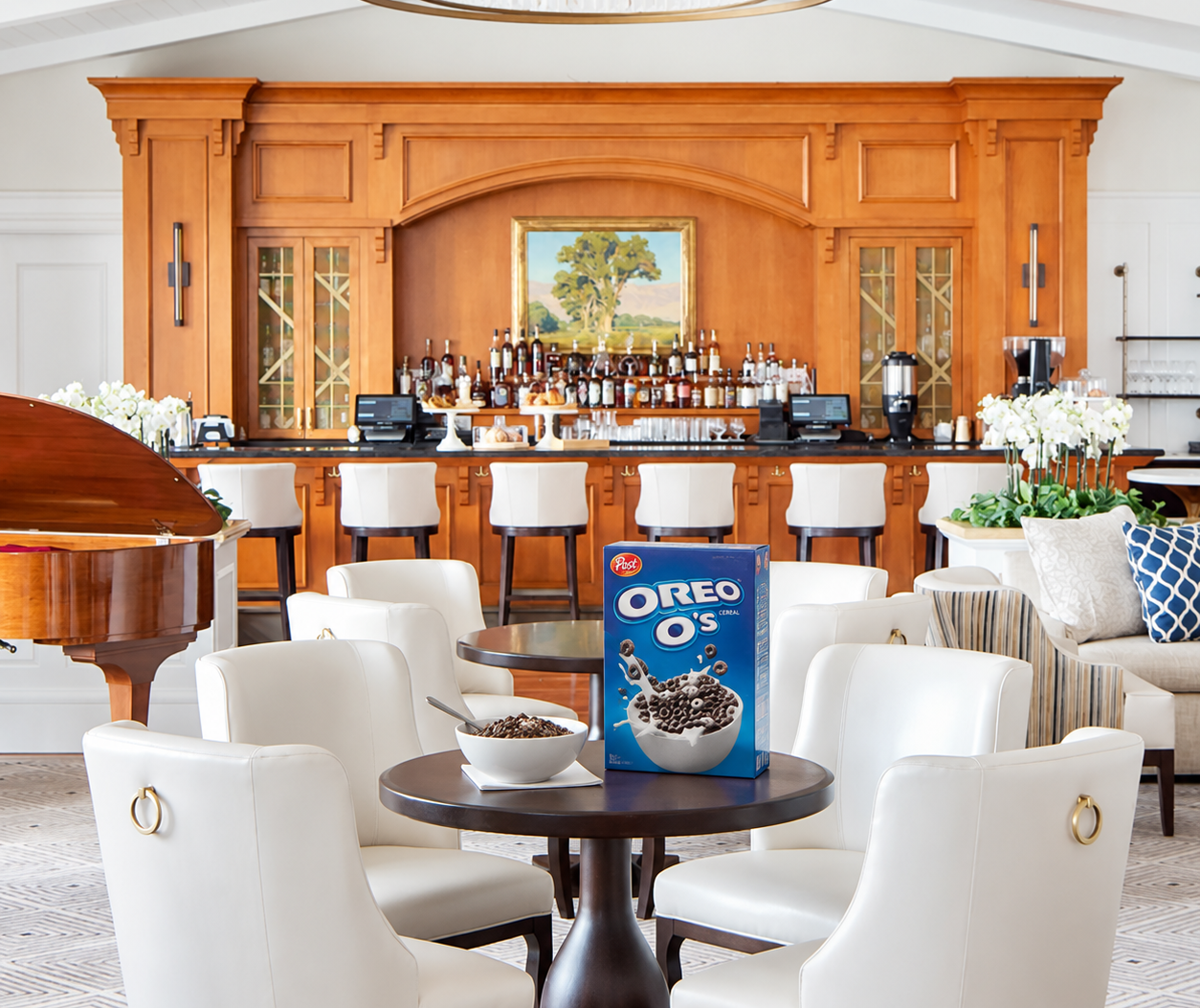 A bowl of Oreo O's cereal and a cereal box on a table in the Montage Laguna Beach lobby, where Omni Advertising's Honda and Connected TV teams discussed consumer behavior and automotive marketing strategy.